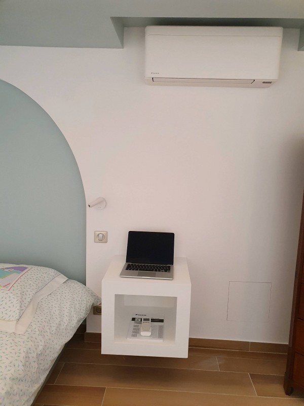 Climatisation d'une chambre rénovée par un  cabinet d architecture